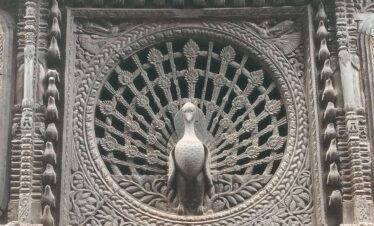 himalayan-walkers-Peacock window wooden art for seven wonders