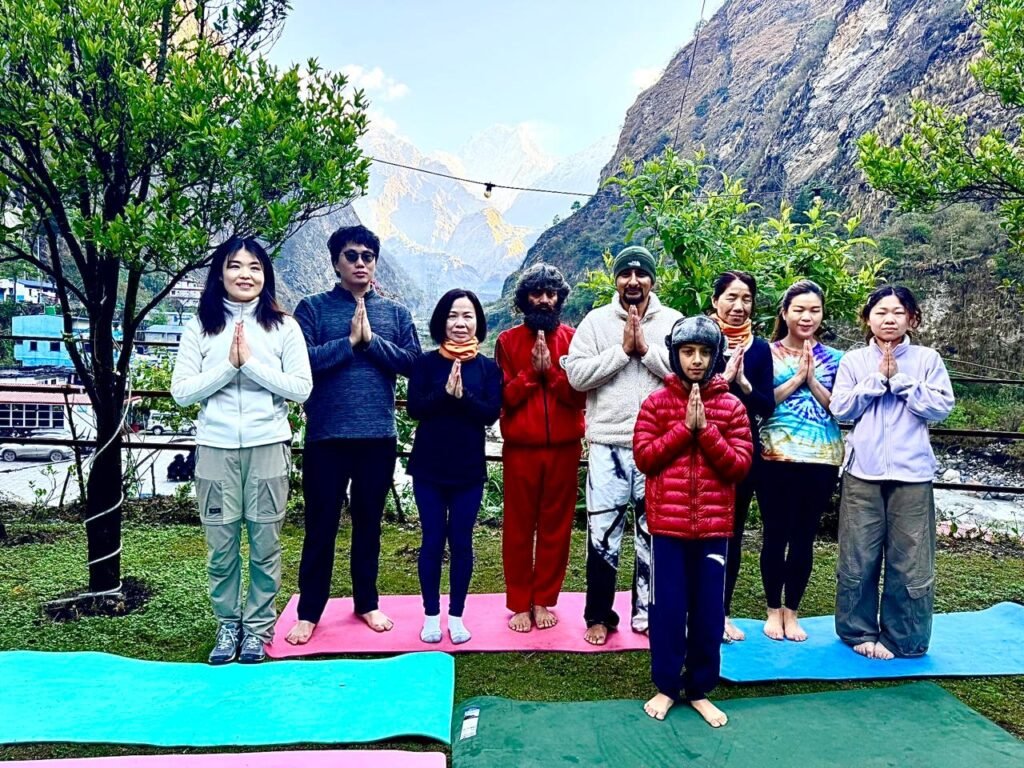 Group of tourist starting yoga session in Nepal Himalaya